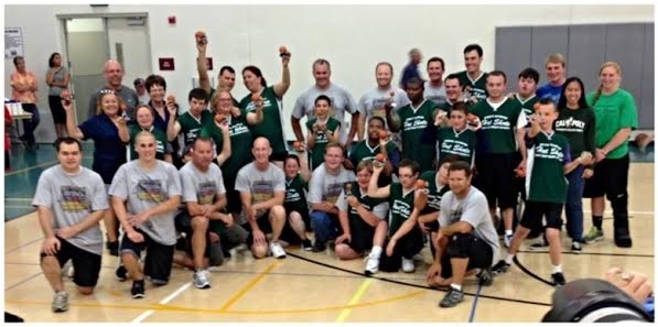 Coach Sarah with her Special Olympics team.